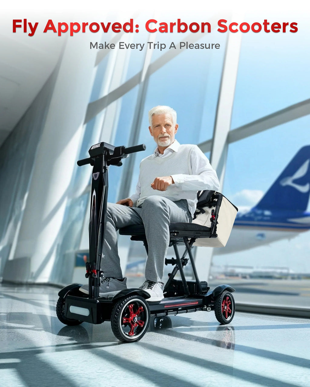 Older man seated on a black carbon scooter inside an airport terminal with airplane visible outside
