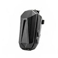 Black hard-shell bike tool bag with angular design, dual zipper closure, and side attachments
