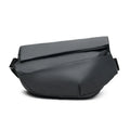 Sleek black modern leather crossbody or waist bag with angular flap and adjustable strap